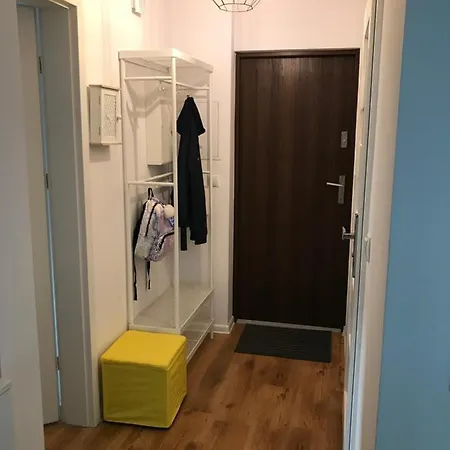 Yellow Clock Apartment Posen