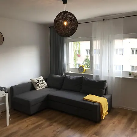 Yellow Clock Apartment Posen